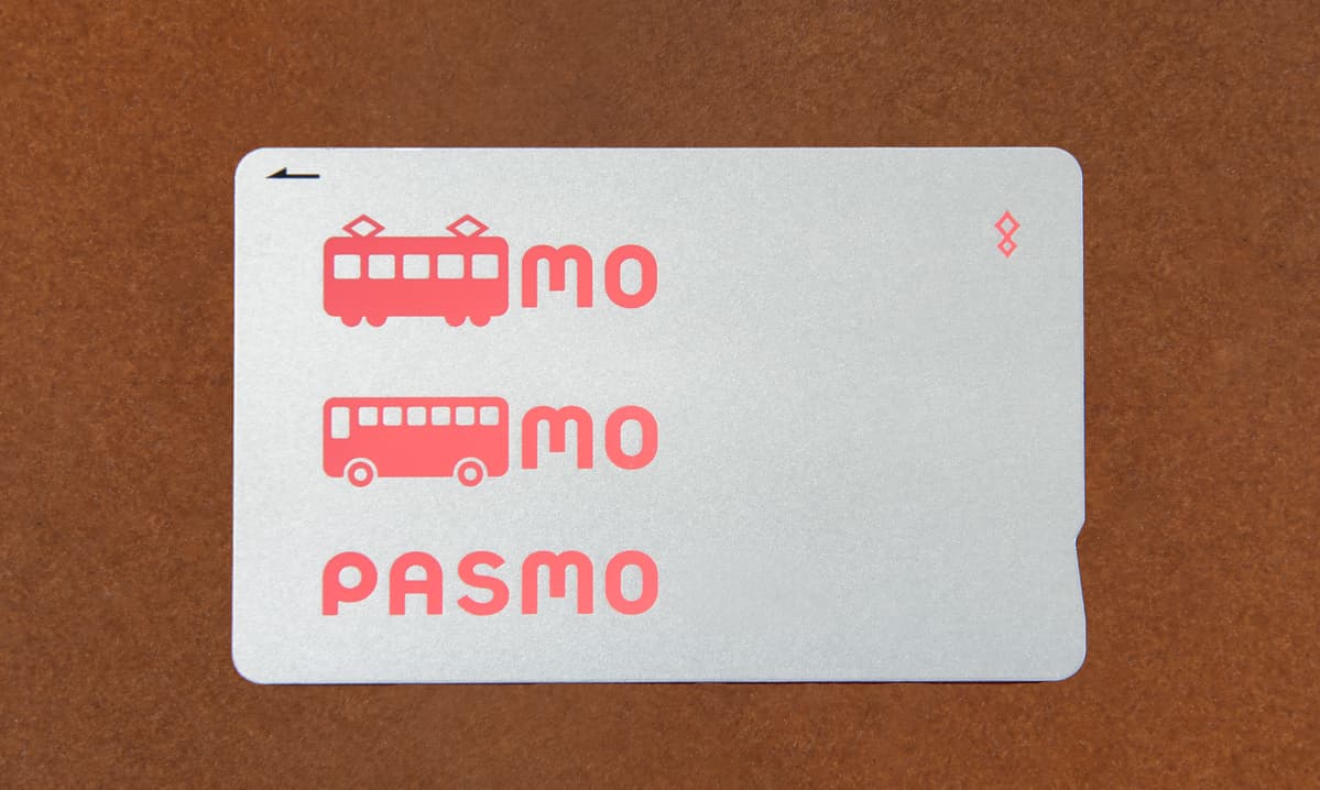 A physical PASMO card with its pink train and bus symbols.
