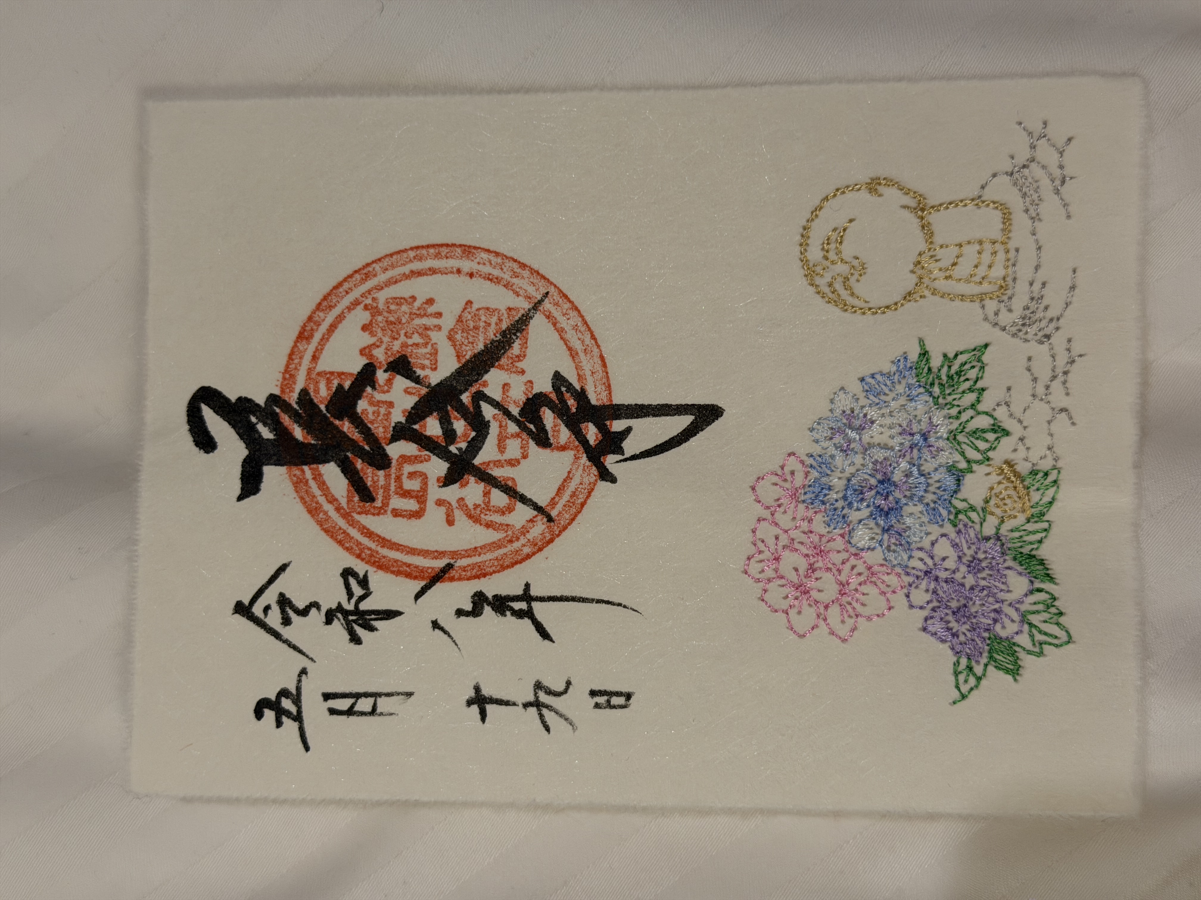 A flower-decorated goshuin from Kamakura Hase-dera shows how designs can extend beyond standard black calligraphy